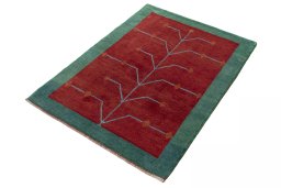 Corner detail of New Persian Gabbeh rug showing border pattern and Wool pile