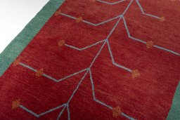 Backside of handmade New Persian Gabbeh rug showing knot structure and weave density