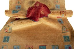 Corner detail of New Persian Gabbeh rug showing border pattern and Wool pile