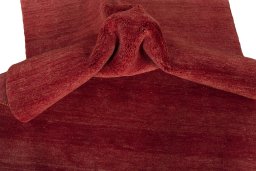 Corner detail of New Persian Gabbeh rug showing border pattern and Wool pile