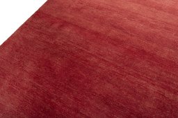 Backside of handmade New Persian Gabbeh rug showing knot structure and weave density