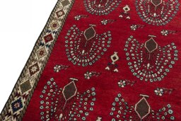 Backside of handmade 2000s Persian Gabbeh rug showing knot structure and weave density
