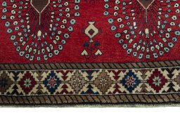 Central medallion detail of 2000s Persian Gabbeh rug from Iran / Persia