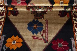Corner detail of 2000s Persian Gabbeh rug showing border pattern and Wool pile