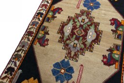 Backside of handmade 2000s Persian Gabbeh rug showing knot structure and weave density
