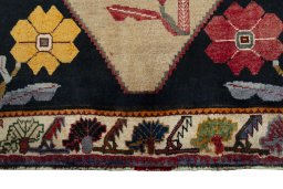 Close-up detail of 2000s Persian Gabbeh rug from Iran / Persia showing Wool weave