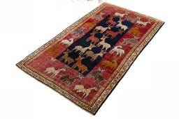 Corner detail of 2000s Persian Gabbeh rug showing border pattern and Wool pile