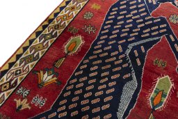 Backside of handmade 2000s Persian Gabbeh rug showing knot structure and weave density