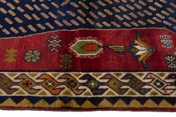 Close-up detail of 2000s Persian Gabbeh rug from Iran / Persia showing Wool weave