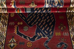 Full view of 2000s Persian Gabbeh rug from Iran / Persia, 203 × 121 cm in Red tones
