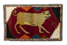 Full view of 2000s Persian Gabbeh rug from Iran / Persia, 187 × 117 cm in Red tones