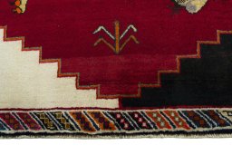 Central medallion detail of 2000s Persian Gabbeh rug from Iran / Persia