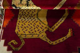 Full view of 2000s Persian Gabbeh rug from Iran / Persia, 187 × 117 cm in Red tones