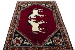 Surface texture of 2000s Persian Gabbeh rug with natural Wool and intricate pattern