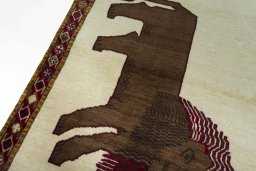 Backside of handmade 2000s Persian Gabbeh rug showing knot structure and weave density