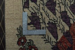 Full view of 2000s Persian Gabbeh rug from Iran / Persia, 100 × 62 cm in Beige tones
