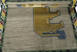 Full view of 2000s Persian Gabbeh rug from Iran / Persia, 156 × 110 cm in Beige tones