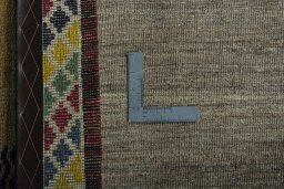 Close-up detail of 2000s Persian Gabbeh rug from Iran / Persia showing Wool weave