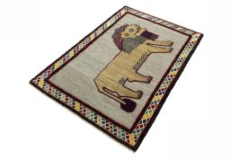Corner detail of 2000s Persian Gabbeh rug showing border pattern and Wool pile