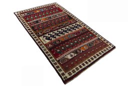 Close-up detail of 2000s Persian Gabbeh rug from Iran / Persia showing Wool weave