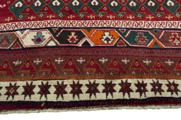 Central medallion detail of 2000s Persian Gabbeh rug from Iran / Persia