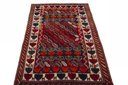 Surface texture of 2000s Persian Gabbeh rug with natural Wool and intricate pattern