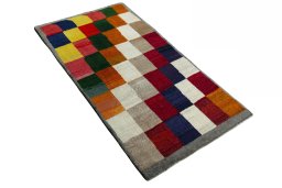 Close-up detail of 2000s Persian Gabbeh rug from Iran / Persia showing Wool weave