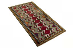 Close-up detail of 2000s Persian Gabbeh rug from Iran / Persia showing Wool weave