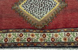 Central medallion detail of 2000s Persian Gabbeh rug from Iran / Persia