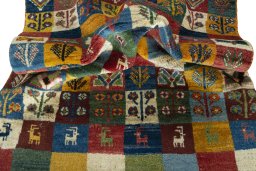 Corner detail of New Persian Gabbeh rug showing border pattern and Wool pile