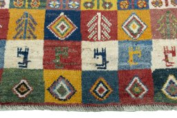 Central medallion detail of New Persian Gabbeh rug from Iran / Persia