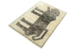 Corner detail of 2000s Persian Gabbeh rug showing border pattern and Wool pile