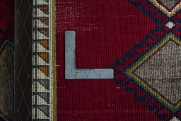 Close-up detail of 2000s Persian Gabbeh rug from Iran / Persia showing Wool weave