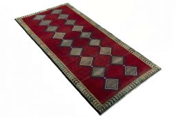 Close-up detail of 2000s Persian Gabbeh rug from Iran / Persia showing Wool weave