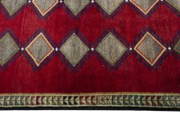 Close-up detail of 2000s Persian Gabbeh rug from Iran / Persia showing Wool weave