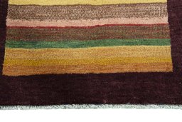 Central medallion detail of 2000s Persian Gabbeh rug from Iran / Persia