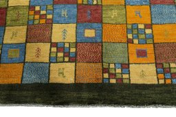Central medallion detail of 2000s Persian Gabbeh rug from Iran / Persia
