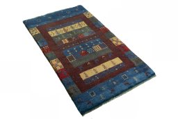 Close-up detail of 2000s Persian Gabbeh rug from Iran / Persia showing Wool weave