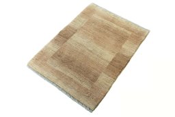 Corner detail of New Persian Gabbeh rug showing border pattern and Wool pile