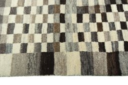Close-up detail of 2000s Persian Gabbeh rug from Iran / Persia showing Wool weave