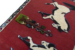 Backside of handmade 2000s Persian Gabbeh rug showing knot structure and weave density