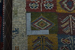 Close-up detail of 2000s Persian Gabbeh rug from Iran / Persia showing Wool weave