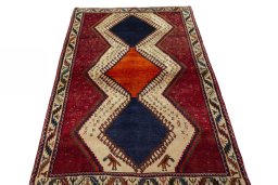 Surface texture of 2000s Persian Gabbeh rug with natural Wool and intricate pattern