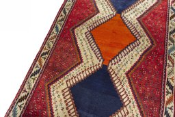 Backside of handmade 2000s Persian Gabbeh rug showing knot structure and weave density