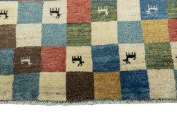 Central medallion detail of 2000s Persian Gabbeh rug from Iran / Persia