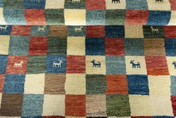 Full view of 2000s Persian Gabbeh rug from Iran / Persia, 150 × 101 cm in Multi Color tones