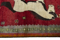 Close-up detail of 2000s Persian Gabbeh rug from Iran / Persia showing Wool weave