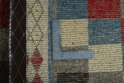 Close-up detail of 2000s Persian Gabbeh rug from Iran / Persia showing Wool weave
