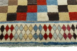 Central medallion detail of 2000s Persian Gabbeh rug from Iran / Persia