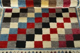 Full view of 2000s Persian Gabbeh rug from Iran / Persia, 153 × 107 cm in Multi Color tones